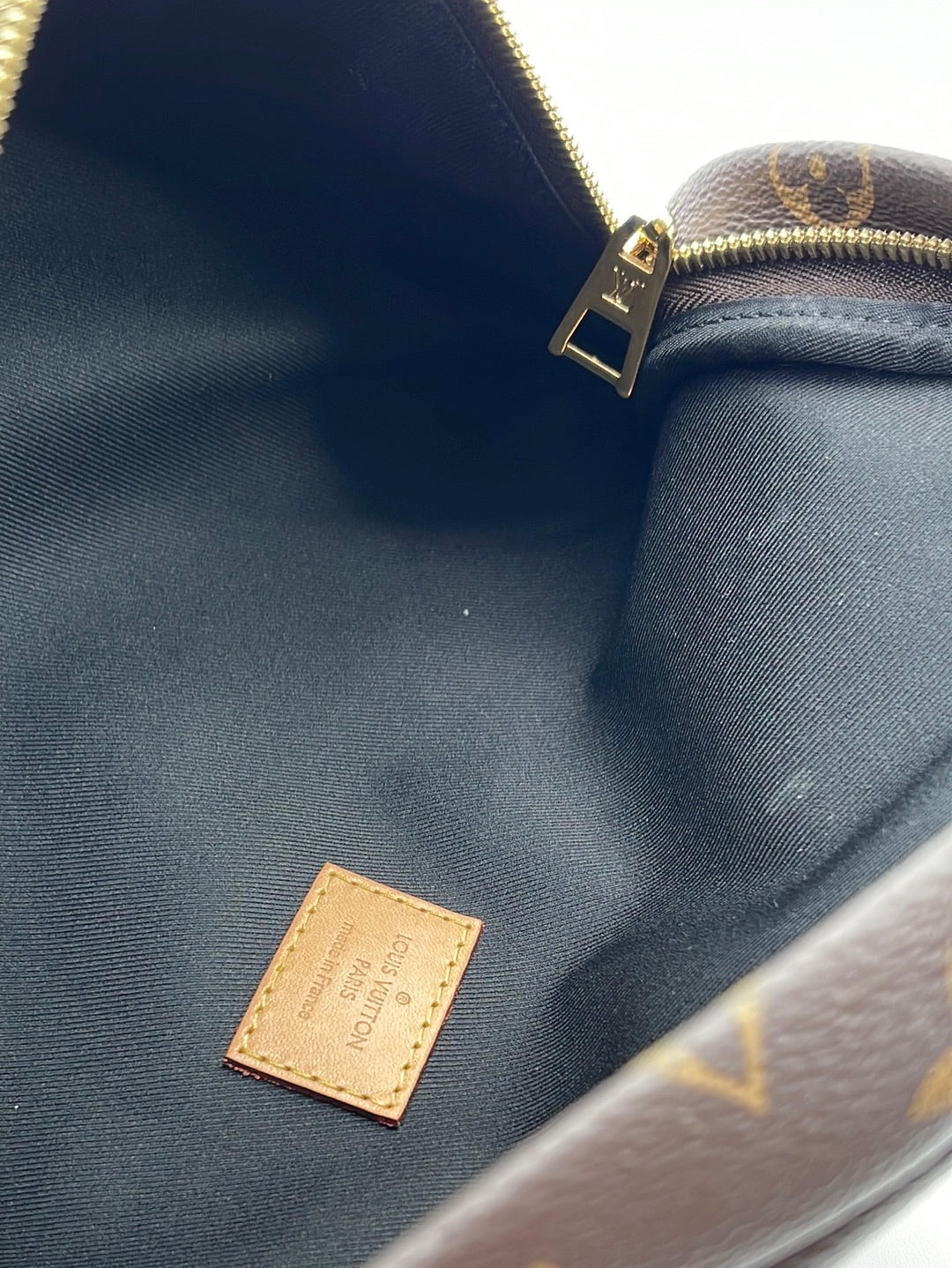 PRELOVED Louis Vuitton Monogram Discovery Bum Bag CA2280 032123
