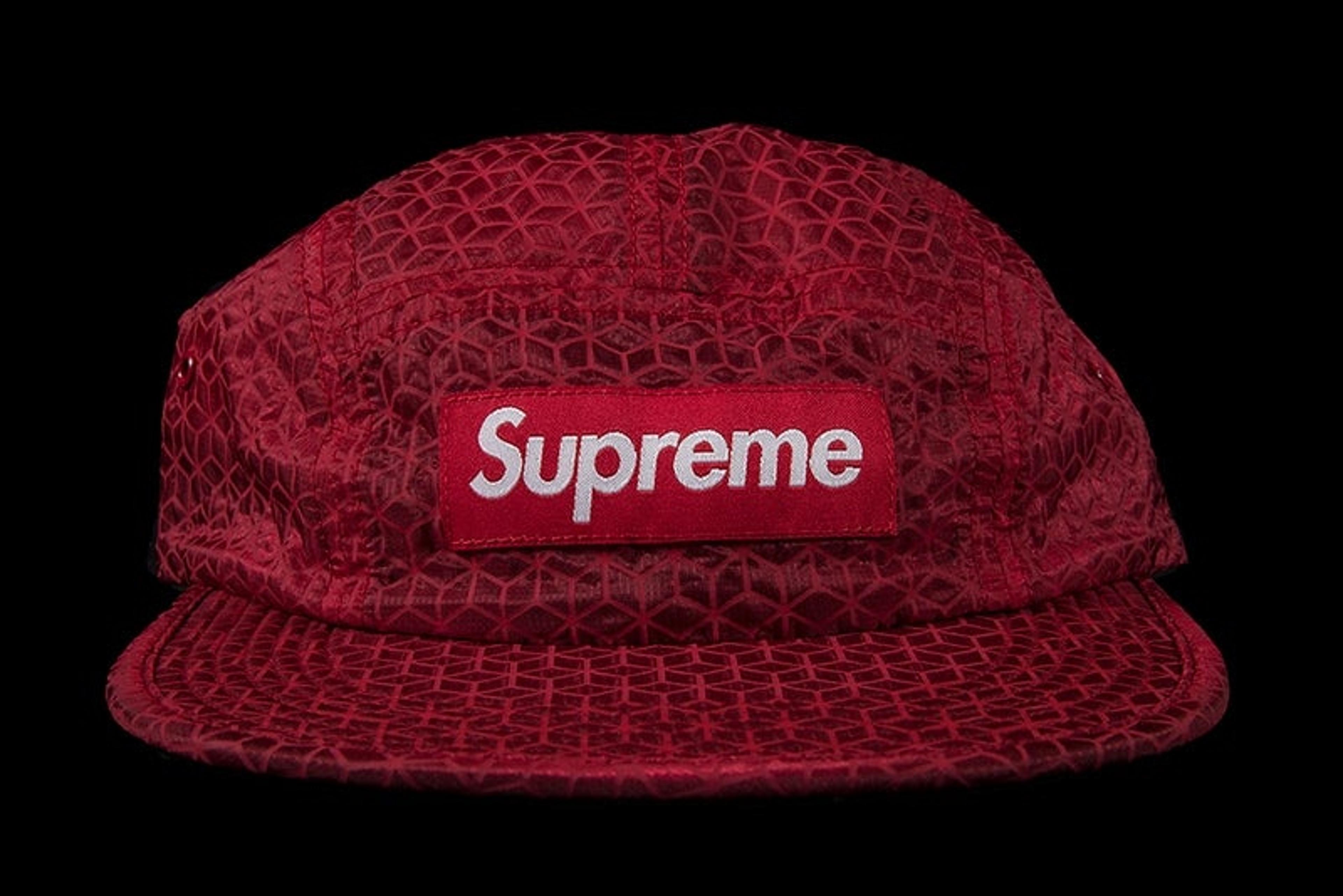 supreme hat on head