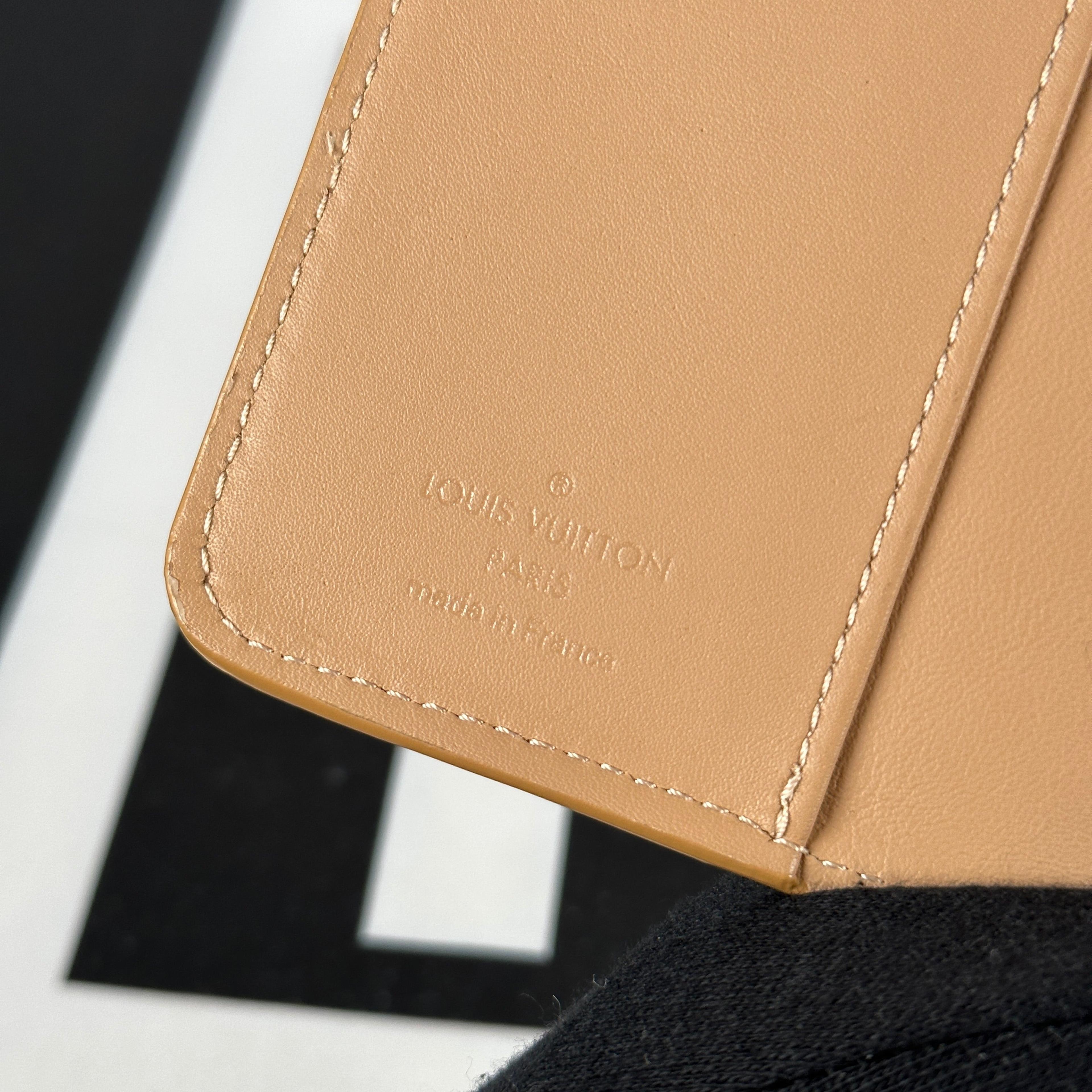 Louis Vuitton Beige Empreinte Notebook Cover (RFID) – Luxury